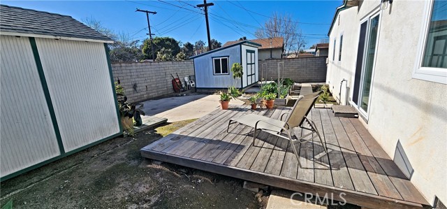 Rear Yard with Patio and Storage Sheds