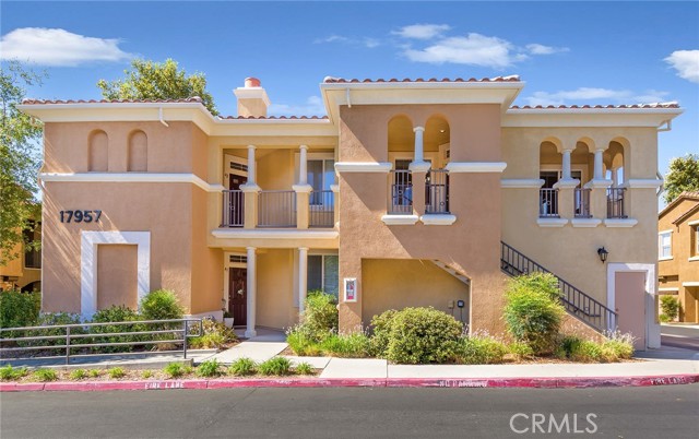 17957 Lost Canyon Road 40 Canyon Country, California Welcome to the wonderful Heather Ridge gated community located in a prime area of Santa Clarita Valley! This upper level, corner unit features 2 spacious bedrooms, 2 bathrooms, a large private balcony, 1 car private garage and a rare extra (assigned) parking space. Upon entering the living room, you will notice gleaming hardwood flooring and a cozy fireplace. The kitchen boasts wood cabinets, granite countertops and a breakfast bar. The master bedroom suite features a private bath with shower/tub combo. Refrigerator, Washer, and dryer are also included in the sale! This family friendly community offers a pool, spa, tennis court and several grassy areas to enjoy. Conveniently located near shopping, parks, restaurants, schools, city transportation and the freeway nearby. Welcome Home!