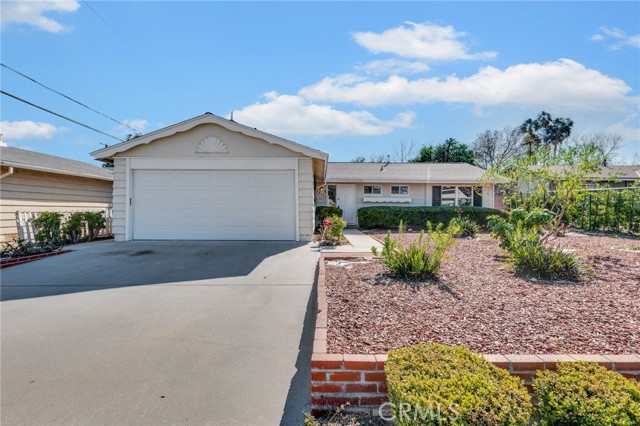 This beautifully remodeled home is located in one of West Hills most sought-after neighborhoods. The eco-friendly landscaping, well-trimmed hedges, colorful flowerbeds and covered entry enhances its eye-catching curb appeal.