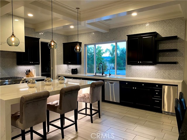 Remodeled Kitchen with waterfall edge countertops