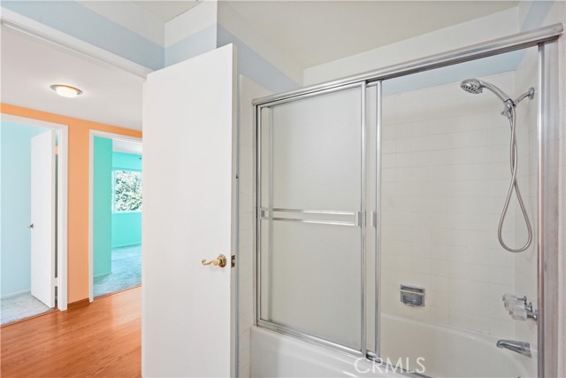 View of the main bathroom upstairs looking toward the other two bedrooms