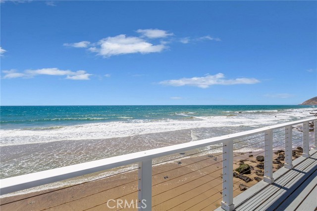 REDUCED! WOW! If you’ve been looking for a well-maintained beachfront Malibu home at the lowest price point on the market, this is your opportunity! 

Located at the end of a small neighborhood of beachfront homes, this 1 bed/1 bath SFR, nicknamed the “Malibu Beach Pad”, boasts jaw dropping oceanfront views throughout and has a generously sized 35 foot private deck that is perfect for sunbathing. The home has also just undergone major, fully permitted renovations to redo the foundation, kitchen, and bathroom for its next owner to enjoy the Malibu beachfront lifestyle.

The newly remodeled kitchen features a brand new quartz countertop, backsplash, and sink. The bathroom includes a redesigned glass shower, rain shower head system, LED mirror light, and updated vanity. The bedroom and living room feature large sliding glass doors that open up to a private, wraparound beach view deck. There’s plenty of space for patio furniture to enjoy the sunrise with coffee or epic sunsets. The house also has private beach stairs which lead you down to a secluded and sandy dog-friendly beach. The foundation has just had all of its 4 ocean-facing piles renovated by hand all the way down to the beach’s bedrock and numerous wood beams replaced with marine-grade materials with stainless steel nuts and bolts.  

The current owner has turned the property into one of the hottest short term rentals in Malibu. You can continue to earn amazing cash flow with this turnkey property through short-term rentals without any issues related to Malibu’s pending Short Term Rental restrictions since this property is located outside city limits in Ventura County. Or make this home your own private beach getaway that is only 10 minutes from local shops and restaurants, yet is located on one of Malibu’s most secluded beachfront neighborhoods. Show and Sell! Let's open escrow today!