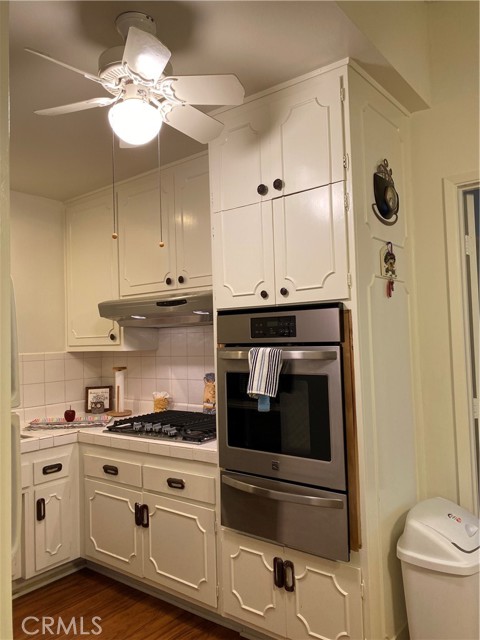 Galley Kitchen, Including Built-In Oven and 5 Burner Stovetop With Range Hood!