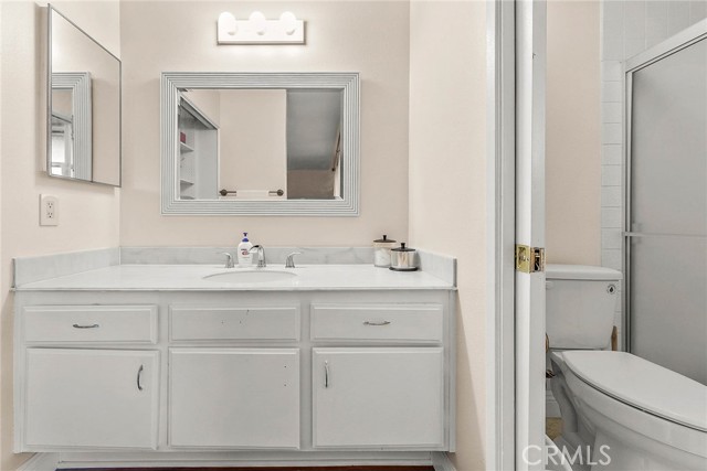 Ensuite Primary Vanity and Private Water Closet