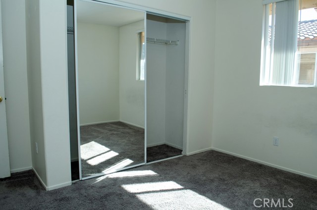 Bedroom 2 / mirrored closet doors