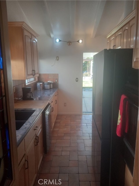 Kitchen looking toward backyard.