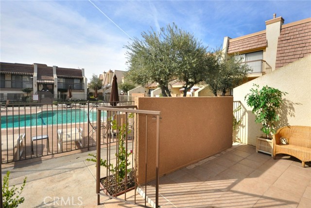 Private patio with view of pool.