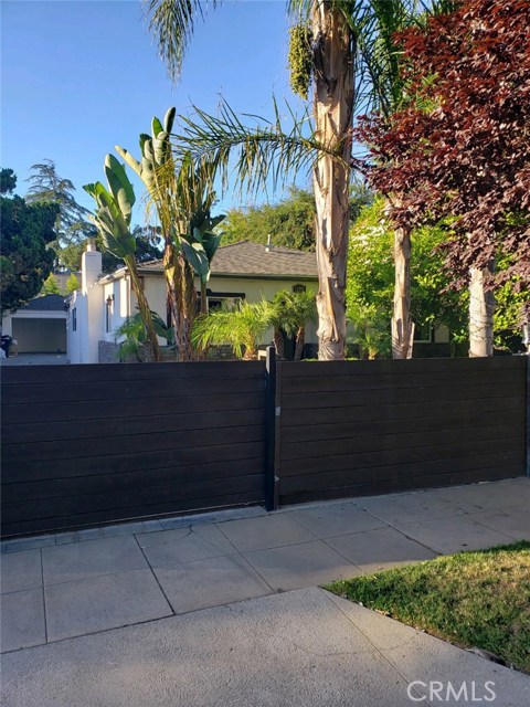 11551 Hartsook Street North Hollywood, California This stunning private and gated home is located in a prime location. The home features an open floor plan centered by a grand fireplace with beautiful marble stone tiles, office/library area, formal dining room, breakfast bar, and large open kitchen with granite countertops. The French doors bring the outdoors in & open to a private backyard & patio area ideal for endless summer BBQs, al fresco dining under the stars & limitless outdoor fun & entertaining.