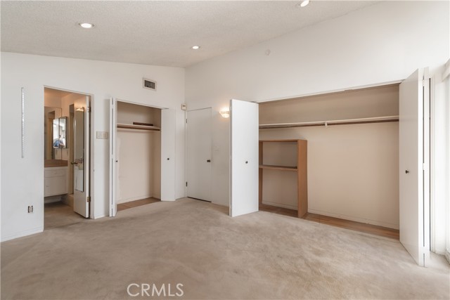 Primary bedroom with 2 closets