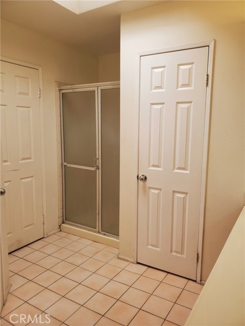 separate shower and toilet of master bath