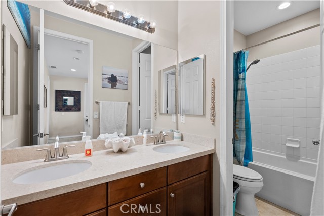 Bathroom with dual vanity.