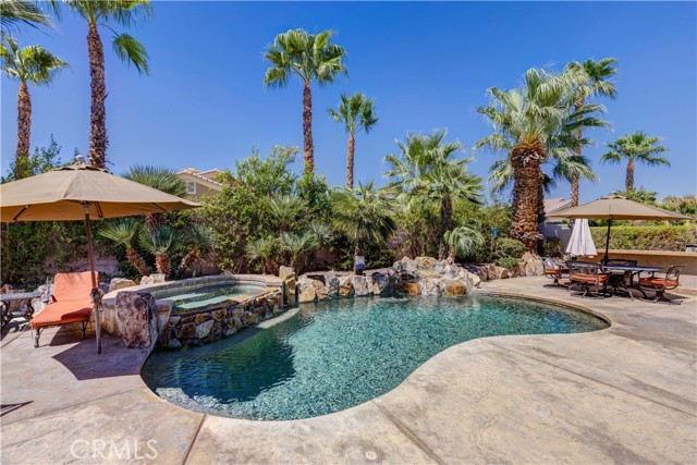 81726 Camino Montevideo Indio, California Gated Sun City Shadow Hills ! Spectacular Largest La Paz floor plan with attached casitas. Private Resort salt water pool and spa. Great room concept and open floorplan. 3 bedrooms 3 baths. Main house has two bedrooms and casitas with bedroom and full bath. Upgraded with all the amenities! this home is sold fully furnished except for personal items. Laminate wood look and tile floors. Large kitchen with center island, granite counters and stainless appliances! Butlers Pantry into the formal dining room with Laminate wood look floors. Separate fully furnished study. Planation shutters through-out the entire home. Main bedroom suite private bath has soaking tub and separate shower with double vanities. Large walk in shower! Backyard Chefs will love the outside kitchen with built-in BBQ. Pool has water and rock features. Covered patio perfect for outside living. Three Car garage with plenty of room for your golf cart.