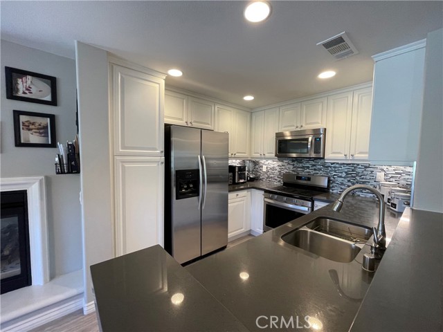 Updated kitchen with stainless steel appliances