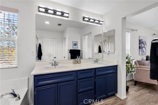 Dual vanity in master bathroom.