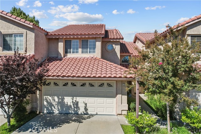 28105 Bobwhite Circle 120 Saugus, California Welcome home to the highly sought out Brock Canyon Villas Community. The second you walk through the front door you'll fall in love with the open spacious floorplan & the pride of ownership displayed throughout starting with the downstairs which has newer laminate flooring, fresh paint within the last year and a fireplace to enjoy those cozy cool evenings. The kitchen features newer stainless appliances, Quartz countertops and a walk in oversized pantry for plenty of storage space. The upstairs bathrooms feature floating sleek vanities for that modern look. In the evening you can enjoy the picturesque view of the hills right outside the front of your home which no other home in the community has. In addition the exterior is scheduled to be painted in October by the HOA. This home won't last..HURRY before it's gone!