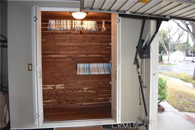 Open doors showing cedar lined closet.