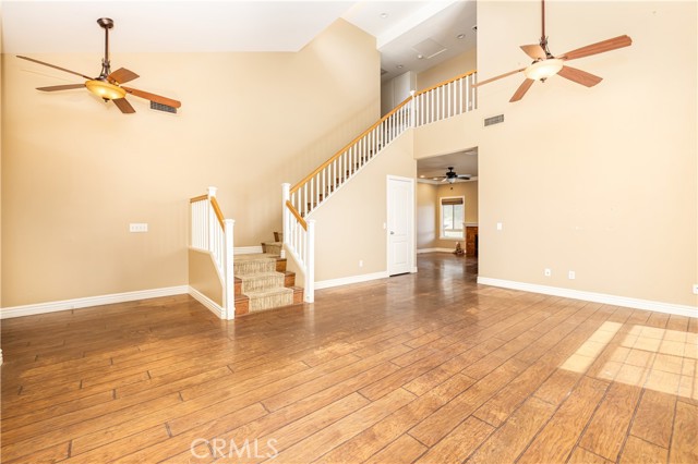 Living room with staircase.