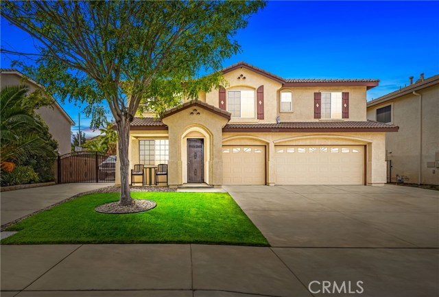 3630 Parkridge Lane Palmdale, California Gorgeous Home Located in a Desirable West Side Neighborhood Featuring 5 Bedrooms, 3 Bathrooms & 2,863 Sqft of Living Space. Custom Two Toned Paint, Custom Baseboards, Elegant Crown Molding Throughout, Upgraded Carpet, Upgraded Light Fixtures & an Open Floorplan. Formal Living Room & Dining Room. Spacious Family Room with a Gorgeous Fireplace with Tile Accents & Wooden Mantle. Spacious Kitchen Sets the Standard with a Center Island, Recessed Lights, Dark Cabinets, Granite Counter Tops, & a Large Walk-In Pantry. Downstairs Bedroom & Full Bathroom with Granite Counter Tops, Upgraded Cabinets, Framed Mirrors, & Tile Flooring. Upstairs Features 4 Spacious Bedrooms with Large Closets, & Ceiling Fans. The Master Suite Features a Large Walk-In Closet, Dual Sinks, & a Separate Shower/Tub. Indoor Laundry Room with a Sink, an Attached 3 Car Garage, & RV Access with Full Hook-Ups. The Backyard Features a Full Length Covered Patio, Luscious Green Landscaping, Large Shed, & Block Walls.