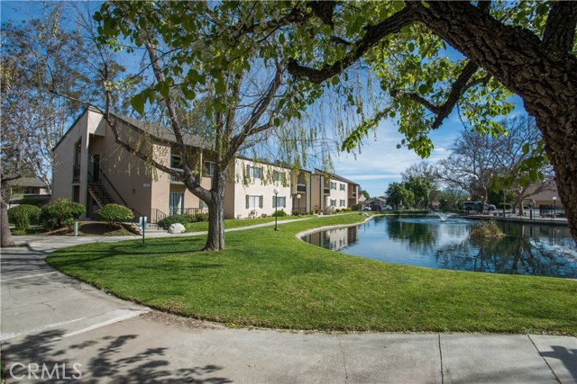 24424 Nicklaus Drive K2 Valencia, California Rare opportunity in the heart of Valencia! First time this two story, 3 bedroom, 3 bathroom floor plan has the market in several years! Open layout, shows Light and Bright! Shutters on two upstairs bedroom windows; Lots of closet space. Large Lake front patio! Very Scenic! Other community features include 2 pools, spa, tennis courts, clubhouse, playground and dog park. Water and trash are included in the HOA. Close proximity to many local amenities including Vista Valencia Golf Course, Cal Arts, COC, lots of shopping and easy freeway access. Make this one your own!