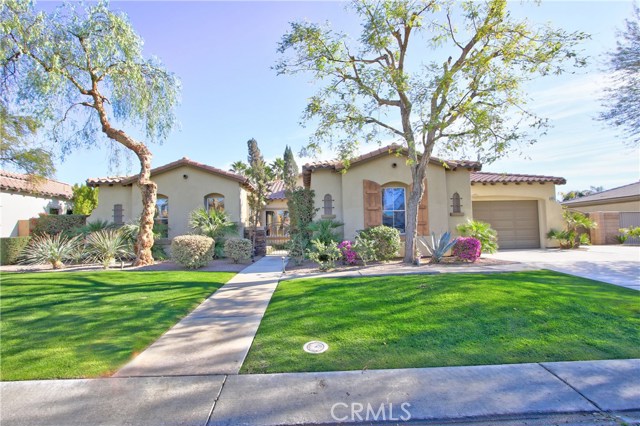 48794 Pear Street Indio, California Located in the beautiful gated community of The Orchard, this wonderful home has it all. 4 bedrooms, 3.5 baths, formal dining, family room, breakfast area with 2751 sq.ft on a 13,000+ sq. ft lot. Enter through a private cozy front courtyard with fireplace, waterfall and retractable awning. Separate forma living and formal dining areas. Family room with fireplace opens to a large open kitchen with granite counters, stainless steel appliances, double oven, pantry, breakfast area and loads of cabinets and counter space. Master suite features a fabulous bath with double sinks, separate tub and shower, walk in closet. The backyard is a true ENTERTAINERS PARADISE with everything you could possibly want. A gorgeous pebble tec pool, spa with waterfall, built in BBQ area, a sand pit, covered patio with ceiling fans, fruit trees and grassy area. Additional features include dual A/C and heat systems, 3 car garage, large side yard for possible RV parking. This is a MUST SEE!!!!!