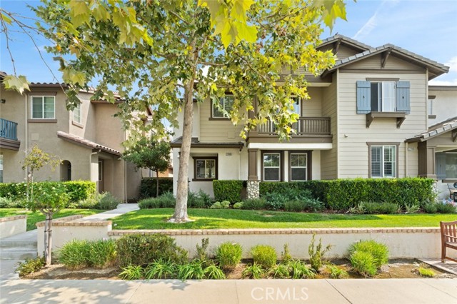 27448 Riverside Lane Valencia, California In the suburbs of a non-gated community sits a 1761 sqft, 3-bedroom, 2.5-bathroom home, move in ready for the next lucky buyer. A paved walkway and a neatly manicured lawn, lead to the front entrance of the home and upon entering you are greeted with an airy and open space, featuring tile flooring all throughout. Venture down to the dining room with an open floor plan that transitions into the kitchen that features tile countertops for the convenience of guests, walnut toned cabinetry, and built-in appliances. An easy flow to the family room that has a fireplace to give the large space that cozy vibe and access to the backyard making, the whole room the perfect venue for entertaining guests. Stairs that lead to the second floor connecting a bathroom with 3 bedrooms, all of which have built in closets, and one of which is the primary with an en suite bathroom. Home includes an attached 2 car garage and a closet with a washer/dryer hookup.