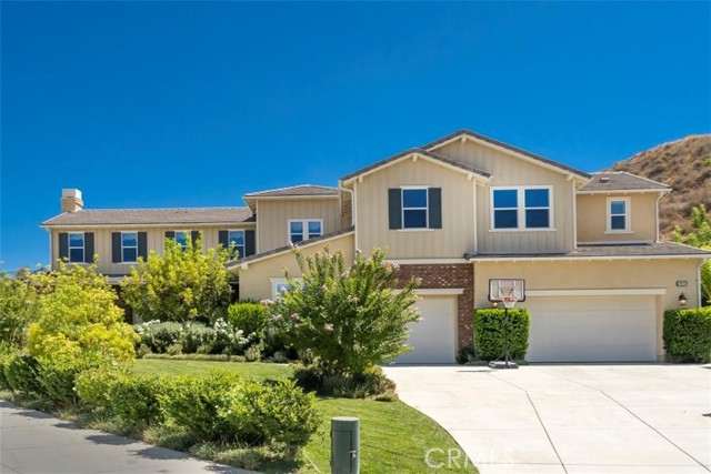 24911 Old Stone Way Stevenson Ranch, California Arguably one of the largest and most highly upgraded executive homes in all of Santa Clarita! This impeccably designed and maintained entertainers delight of a home is located atop the Souther Oaks neighborhood of Stevenson Ranch at the end of a quiet cut-de-sac. The nearly 2/3 acre property has a 1/4 acre producing vineyard capable of producing 500 bottles of wine from one harvest in addition to the sparkling pool and large outdoor kitchen and entertaining space outside. Inside this beautifully designed homes you will find great attention to detail and high end finishes and design at every turn. This highly sought after home and community is rarely available so don't miss your chance to own the best home Santa Clarita has to offer.