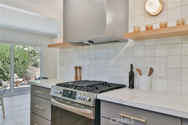 New stainless oven & designer hood