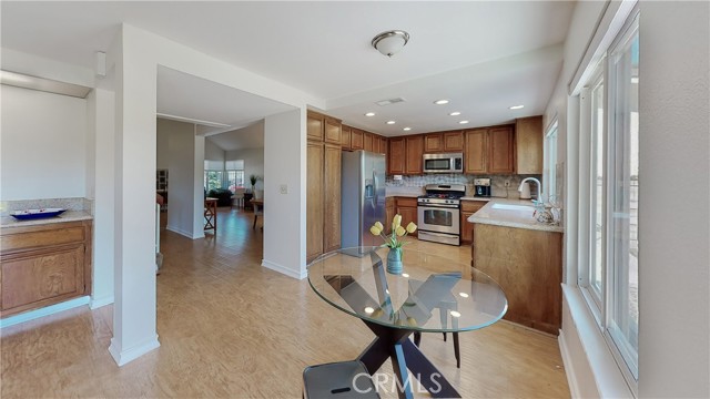 View into eating area, kitchen and to left the dining room and living room space!  
