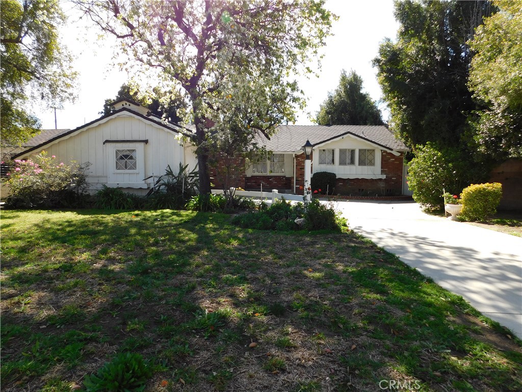 New Listing in Northridge This 4 bedroom, 2.5 bathroom l home  with  spacious and comfortable living spaces that offer a luxurious and relaxing lifestyle. 
This home has a sparkling pool, which provides a refreshing oasis that's perfect for entertaining . The home's interior includes a spacious living room, dining room, family room and master bedroom and bath. This home is perfect for adding an ADU as there are two separate 2 car garages. Located close to shopping, several parks and easy access to major freeways and transportation.