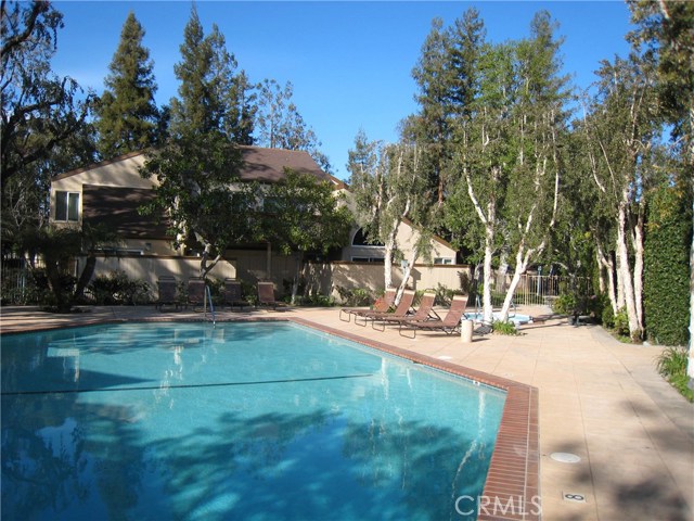 Resort style pool area with year round heated spa at upper right corner.