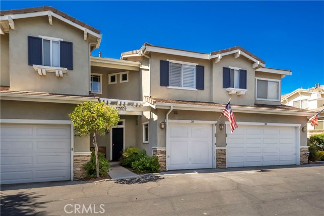 23602 Big Sky 110 Valencia, California MOVE IN READY TOWNHOME LOCATED IN THE HEART OF VALENCIA!! This two bedroom, two bathroom property will be perfect for a first time home buyer or investor. This unit has a private pathway entrance, as you enter the home, you will notice the entire house is freshly painted. The kitchen opens to the living and dining area. Kitchen features granite counter tops and stainless steel appliances. Enjoy summer nights out on the patio, sellers are leaving the BBQ. Upstairs you will find two spacious bedrooms, including the master, which has an updated bathroom attached. Other home features include: fireplace, plantation shutters, new water heater, new garbage disposal, attached garage and 1 additional parking spot. You cannot beat this location, located close to shopping, dining, parks, top rated schools and NO MELLO ROOS.