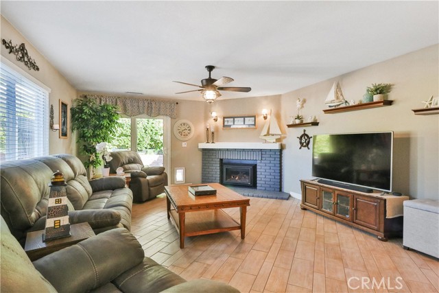 Family Room with Fireplace and a Slider to the rear yard