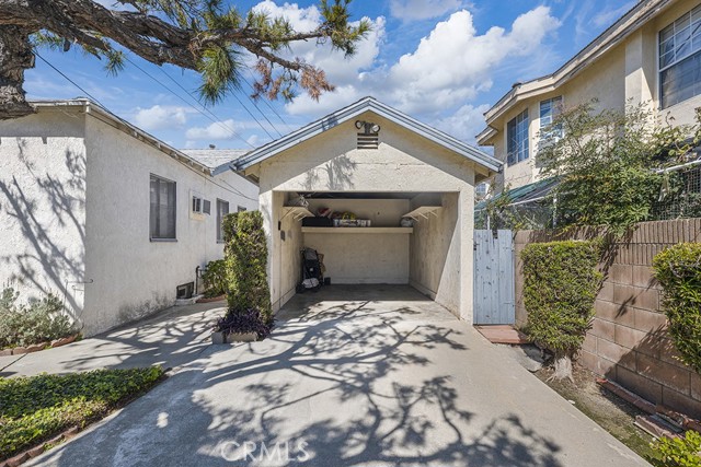 One Car Garage for Unit C and One Car garage for Unit D off the alley.