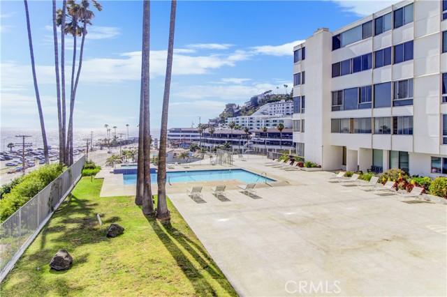 17366 W Sunset Boulevard 105 Pacific Palisades, California Price adjustment on this one of a kind property! Beach hangout! Second home? Weekends on the sand? Secure and low maintenance.
Look no further for your sunset and surf views! Every. Single. Window. Views! This unit is arguably the closest to the water in the beautiful and iconic Edgewater Towers complex. Beautifully remodeled, this hip space boasts an open floor plan designed for the entertainer! The large remodeled kitchen has loads of storage space, two counter seating areas, stainless appliances, granite counters, redone cabinetry, recessed lighting. The living room is enormous and boasts literally views from everywhere you look, as does the dining room. The huge windows let in light from everywhere, and there are vistas to see at every time of day. The bedroom area has two nice sized bedrooms each with their own baths and views as well, and the master has a large closet space, dressing area and a custom, built in shoe closet! The decor is hipster chic and both bathrooms have been completely remodeled. The complex itself has two pools, tennis, hiking paths, a gym and plenty of outdoor sitting areas to enjoy the massive views of the Pacific, and the Queens necklace. Resort like living is the best way to describe this complex. This landmark property is convenient to everything, markets, restaurants, shopping and literally a stone's throw to the beach and Gladstones! Don't miss this wonderful opportunity in Edgewater Towers, it's a rare one!