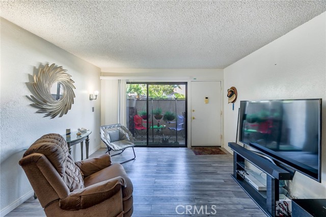 Family room with sliding glass door to patio.