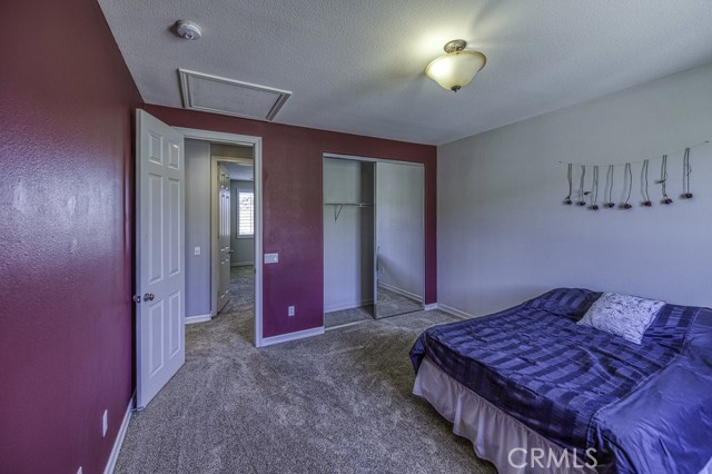 llarge secondary bedrooms with TALL ceilings and mirrored closets