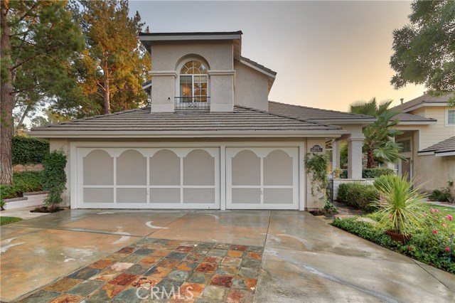 23702 Skycrest Circle Valencia, California Unbelievable opportunity in the heart of Valencia! This home has it all. Feels like a model! 4 bedrooms, 3 bathrooms, w/one bed & bath downstairs, plus bonus workout area or kids room. Recently remodeled kitchen w/stainless steel, Viking range, Sharp drawer microwave, top of the line custom cabinetry, soft-close drawers, pull-out shelves & more. Three of the four bedrooms have built-ins, requiring no furniture. Every bedroom has built-in closet organizers. Upstairs: Tiffany bedroom has two built-in bunkbeds & a twin bed, sleeping 3; Adjacent bedroom has extra long twin bed & downstairs bed is a full. All bathrooms recently remodeled including TOTO bidets w/warmed toilet seats. Upstairs bathroom has deluxe spa tub. Upstairs built-in office area; Large master walk-in closet; Smart, energy efficient upgrades include KEVO keyless entry; NEST: Cameras, Fire & Carbon Monoxide detectors, Doorbell w/camera & Dual thermostats for split zone A/C; 3 Google Home units control 19 lights, water fountain & sprinkler system; Electric vehicle 240V garage outlet; Custom light fixtures & recessed lighting w/LED lights; Solar; Newer 50 gallon water heater. Indoor-outdoor living w/the most tranquil backyard-- lush & beautiful, a gardener's dream! Relax on the slate patio under the twinkle lights and enjoy the Sonos (wifi) speaker system; Built-in Turbo BBQ. Low HOA, no Mello Roos! 3 community pools, basketball & tennis court. A must see!