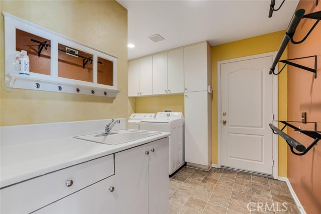 Laundry Room downstairs off from the kitchen