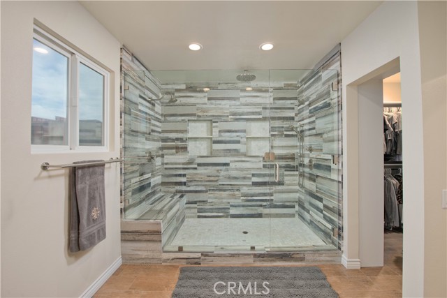 Custom shower with 4 shower-heads including Rain shower-head.