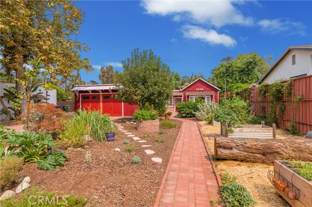 11733 Kling Street Valley Village, California Completely Renovated 2 Large Bedroom, 2 Full Bath Sanctuary retreat home. Also, a Convertible 2-Car Garage Studio Office Space. This chic Farmhouse is fully automated to enjoy the built-in surround sound distributed audio with Sonos & Airplay, video and security in every room. Featuring: Vaulted ceiling Living room with 2 bay front yard view windows. Quartz countertop Open Kitchen with a Viking range & hood, Custom Maple coffee counter. Newly refinished Bamboo wood floors. A shower & bathtub Tiled main Bathroom. True harvest sunset color decorative concrete floor leads you to the generously large master bedroom with walk-in closet, wood paneled suite. The Tainted glass window colors above invite you to open the door to the Talavera tiled Emerald bathroom wood cabinetry retreat with hers & his Talavera basins, Jacuzzi tub, separate Walk-in shower & bidet. A Home theater is installed in 2nd Bedroom. Newly painted inside & out. Central air & heat. Copper plumbing. 2 New Custom Wood Garage doors. Enjoy a Stone BBQ in the tarp shaded Patio backyard. Potential RV access. Heritage Sycamore trees provide afternoon shade throughout. Raised vegetable, herb & flower beds ready for spring planting. Apple & Lemon trees give lots of fruit all season. Ample seating space on the brick patios surrounding the home to enjoy many variations of the Beautiful Native Garden found here. Approximately 1,132 sq. ft. inside Home / approx. 400 sq. ft. in Garage / 7,949 sq. ft. lot size.