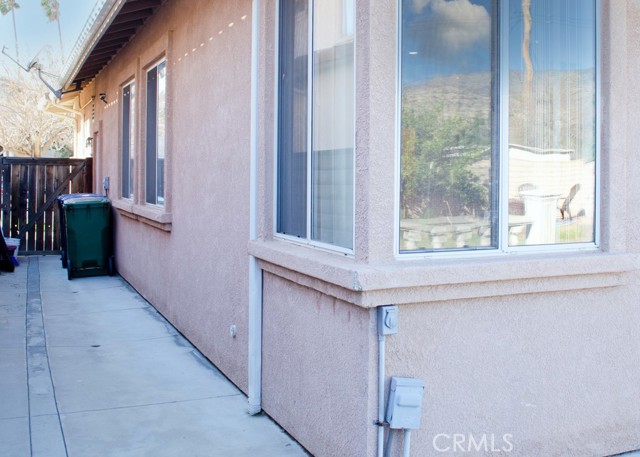 Side yard and gate to front yard