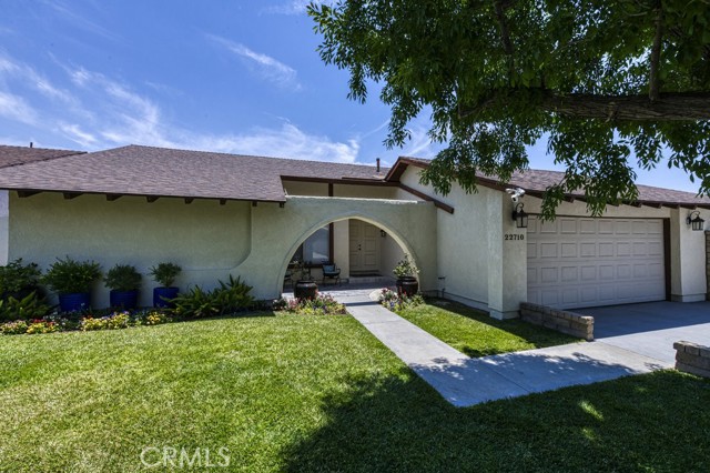 22710 Rio Bueno Court Valencia, California Welcome to this 4 bedroom 2 bath home located in the Monte Verde Tract of North Valencia. This beautiful home is light and bright and has been tastefully updated and upgraded with quartz countertops in kitchen and both bathrooms have been recently remodled. New waterproof LVP flooring throughout home. Spacious bedrooms, high ceilings, recessed lighting, gorgeous backyard perfect for entertaining. Huge side yard for parking your toys and extra wide and long driveway allows for RV parking as well. (Currently housing 30 ft trailer with ease) with NO HOA OR MELLO ROOS! All of this plus a quiet CUL-DE-SAC!! Home is turn key and ready for its new owners!