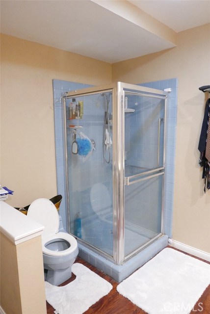 Master's Bedroom Bathroom with portable glass shower room that gives plenty of room.