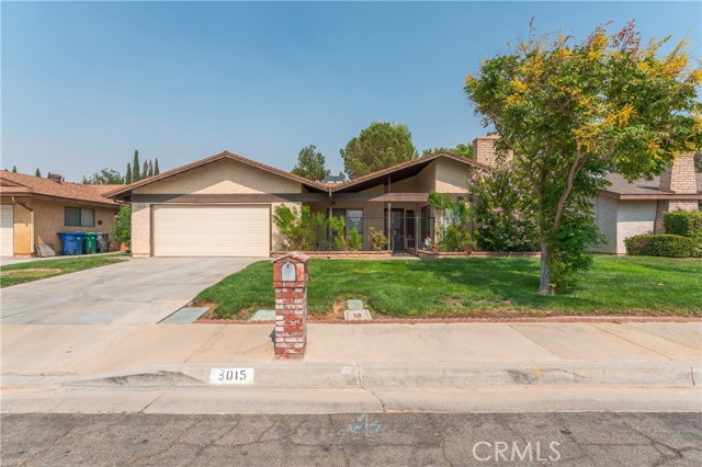 3015 Glennel Avenue Lancaster, California Home Sweet Home! This home is truly an amazing opportunity with clear incredible pride of ownership and is in Move-in-Condition. Home features 3 bedrooms, 2 baths, bonus room, almost 1600 sq/ft, attached 2 car garage, and a large private backyard with over 8000 sq/ft. Upon arriving, buyers will be immediately impressed with the charming exterior appeal and great private entrance. Upon entering buyers will appreciate all brand new flooring & new neutral colored paint. The home has a great useful floor plan with a very large living room, master bedroom with double closets, lots of storage, a well-designed kitchen, and a bonus room perfect for office, den, or potential 4th bedroom. The dining area leads to the private large backyard that is perfect for peaceful enjoyment or fun BBQs with family & friends. Home is centrally located; minutes away from AV College, near many shopping, dining & medical amenities, and is very commuter-friendly. Call & Schedule a Showing Today!