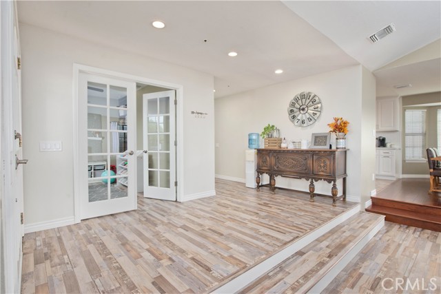 Entry and french doors to office or potentially the 4th bedroom.