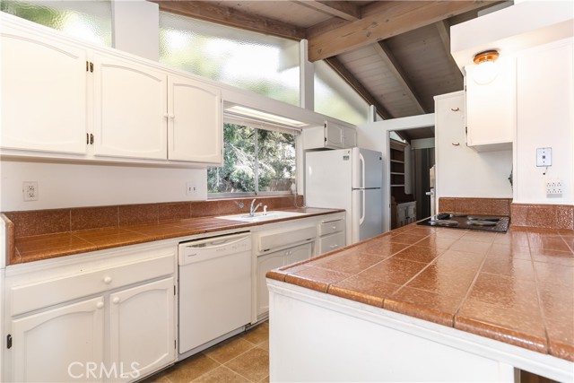 Kitchen with open beam ceiling