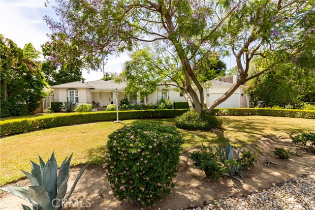 4845 Gaviota Avenue Encino, California Welcome home to this beautiful ranch style traditional home in the heart of Encino! Light and bright throughout, this 3 bedroom, 3 bath home is spacious and private with over 11,000 sq ft lot just perfect for entertaining! The brand new chef's kitchen has its own breakfast area with new windows over looking the quaint tree lined street. The remodeled kitchen had brand new quartz counters, custom cabinetry, stainless steel appliances and tile floors. The living room has a brick fireplace and large windows overlooking the circular driveway. The spacious family room also has a gas fireplace and a wet bar for all your guests. The oversized master bedroom has a separate area that can be used for an office or yoga studio and big sliding doors that lead to the back yard. The master bathroom was recently remodeled with double sinks and a large shower. Other great features of the home include lots of storage space, custom built-in shelves, and a large laundry room. The backyard is so secluded with beautiful trees, bbq area and a iron water fountain. The finished 2 car garage has built-ins for all your storage. Located just seconds from Ventura Blvd and close to everything!