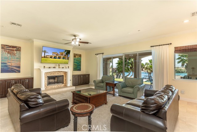 Living room w/ fireplace.
