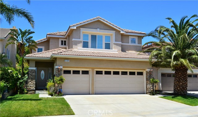 11389 Modena Lane Porter Ranch, California Style and Elegance Grace this Immaculate Home Perfectly Nestled on a Cul de Sac in the Serene Hills of Prestigious Guard Gated Sorrento. This 4 Bedroom Plus Bonus room is Meticulously Maintained. Open Concept Floorplan with High Ceilings and Abundant Windows Illuminate the Interior. First Level Offers a Bedroom and Guest Bath with Shower, Living Room with Wrought Iron Circular Staircase, Custom Drapery and Decorative Niches and Formal Dining Area. Chef's Kitchen Features Granite Counters and Center Isle, GE Stainless Steel Appliances, Refrigerator, Double Oven and Microwave. Breakfast Area Adjacent to Spacious Family Room with Romantic Granite Fireplace all Overlooking Backyard with Paver Tiled Patio Area, Grassy Play Area, Tropical Plants and Built-in BBQ Center. Plenty of Privacy from all the Foliage. Generous Master Suite with High Ceilings and His and Hers Walk-in Closets and a Luxurious Master Bath with Oval Spa Tub, Shower and Vanity Area with Dual Sinks. Sizable Bonus Room can be used as a 5th Bedroom, but also Great for a Movie or Exercise Room. Additional Features are Plantation Shutters, Ceiling Fans, Alarm System, Full 3 Car Garage with Built-in Cabinets, Community Pools/Spas, Playground, Close by Fwys, Parks, Hiking, Shopping, CSUN, Much in Demand Porter Ranch K-8 Comm. School and Vineyards Shopping Center with Theater.