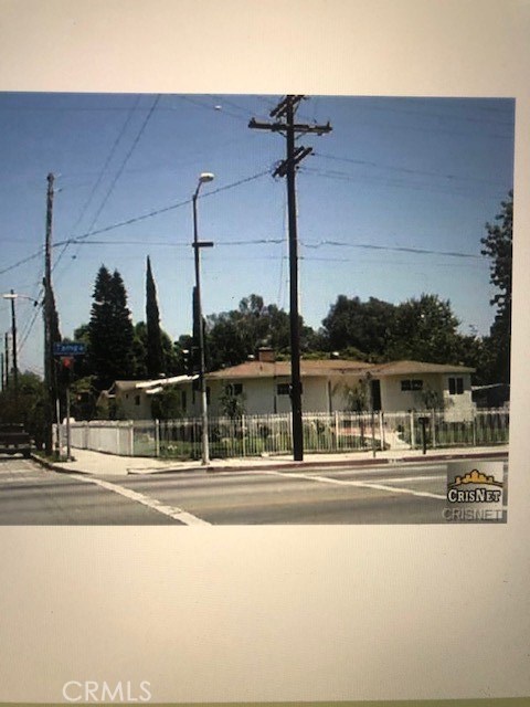 7958 Tampa Avenue Reseda, California Located in the center of the San Fernando Valley this single story corner house actually offers 5 spacious bedrooms and 3 full bathrooms (assessors records show 4 bedrooms and 3 bathrooms). The open wooden floor plan has a large living and family area, fire place, fully remodeled kitchen with granite counter tops, a separate room for laundry inside, central air conditioning and heating supported by a 5 ton brand new unit. It also has a large (almost 11000 sq ft) lot size with concrete flooring for ample parking and on the side of the floor there are fruit trees such as guava, all kinds of citrus fruits, peach, plum and fig fruits, The house is located in the center of 101 and 118 freeways, walking distance from Cleveland Charter High School, less than one and half mile away from CSUN and Pierce College, less two minutes drive from Costco, Northridge Mall, Best Buy and 24 hour fitness The house is big enough to fit two families.There is a second kitchen next to the Barbque in the backyard, The owner is opened to long term lease for a rehab center or nursing home. Showing strictly by appointment. 24 hours notice is required. A short notice can also be entertained depending upon the timing.